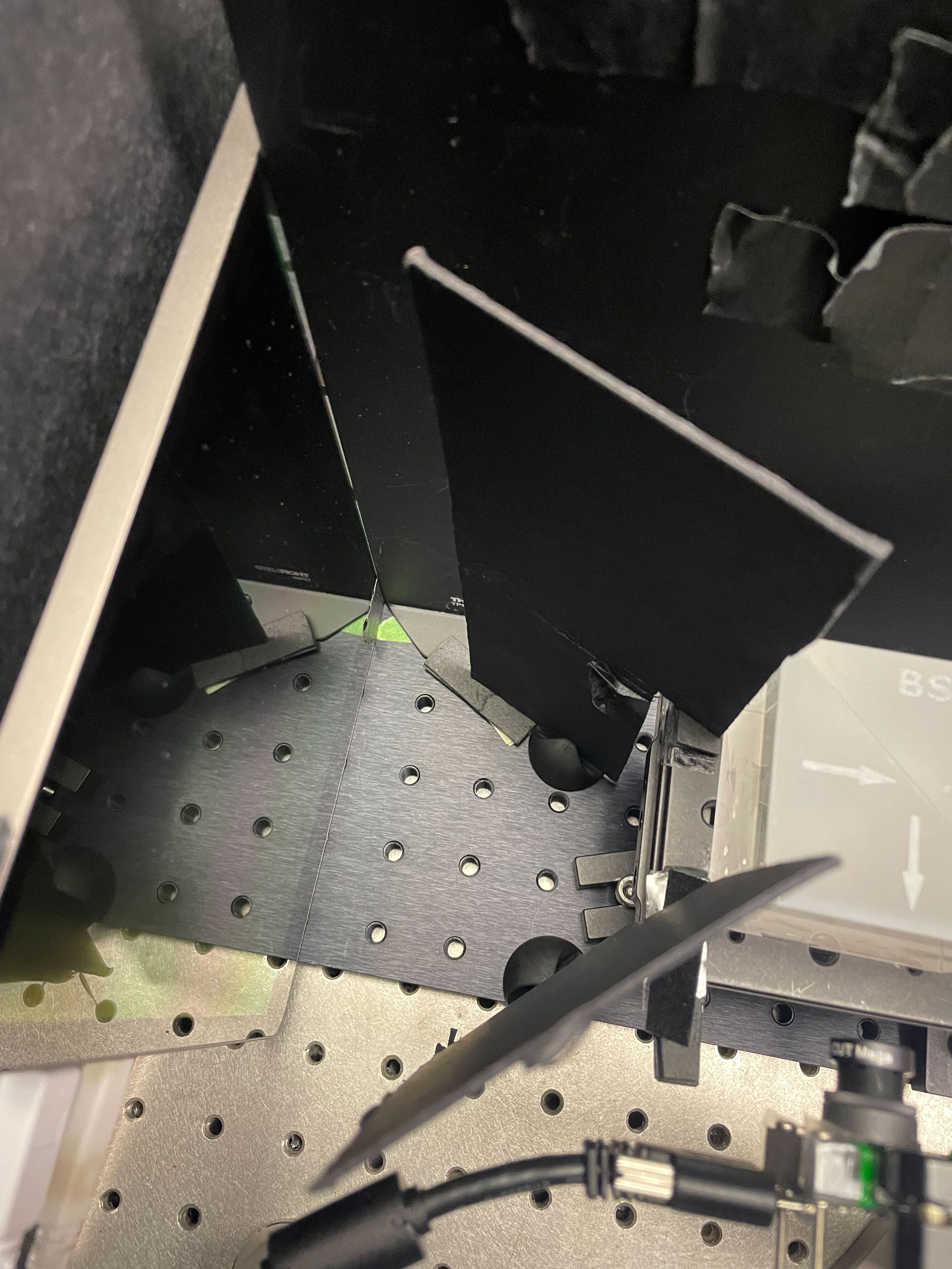 Dividers between display and beamsplitter to control for stray light.