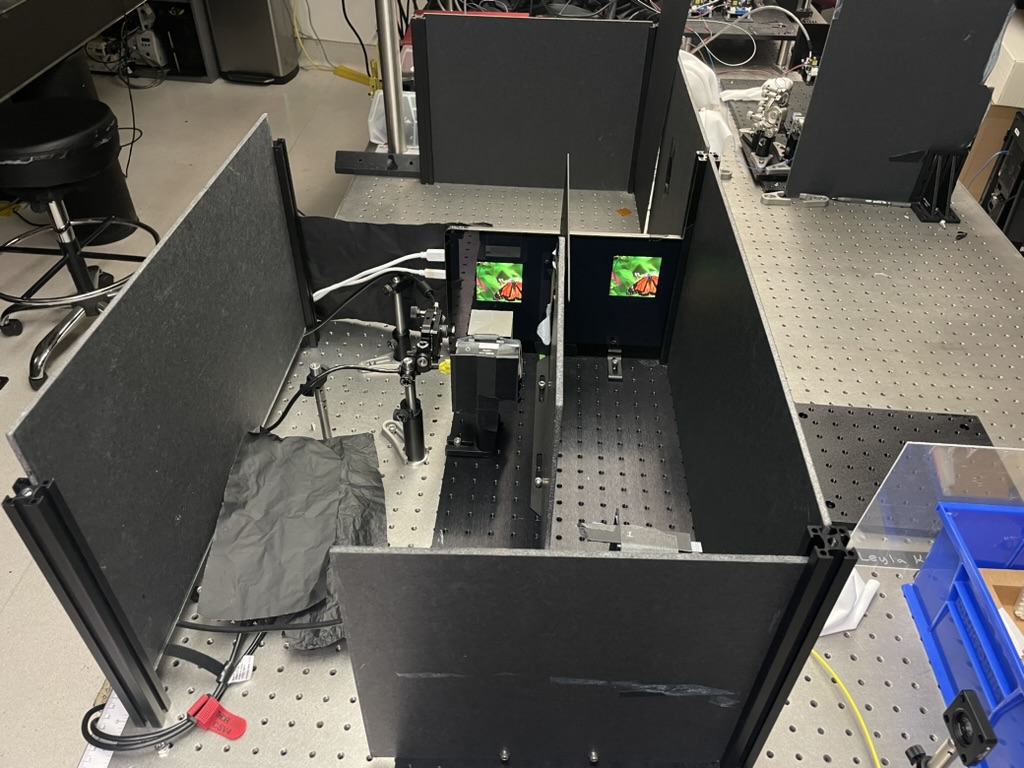 Full hardware set up with images being displayed.